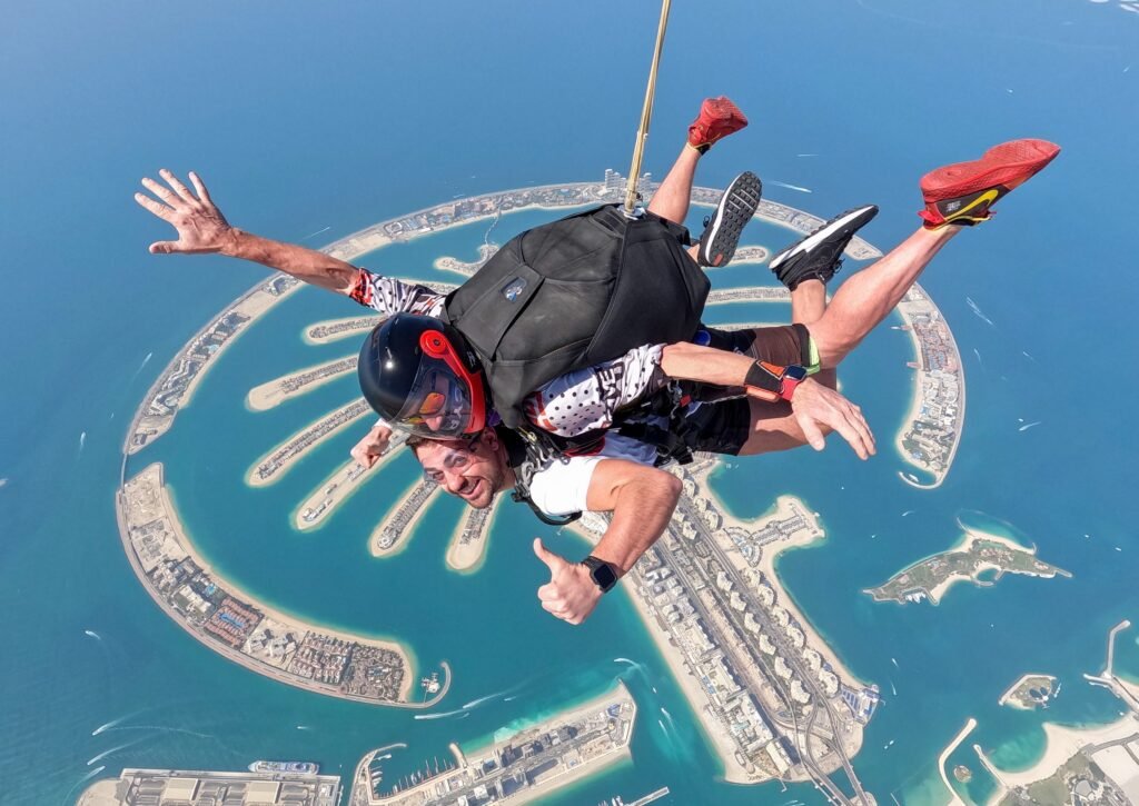 Skydive Dubai – Tandem Skydive (Palm Dropzone):
The thrill of a tandem skydive above the iconic Palm Jumeirah, offering aerial views of Dubai’s coastline and skyline, guided by world-class instructors and the highest safety standards.
